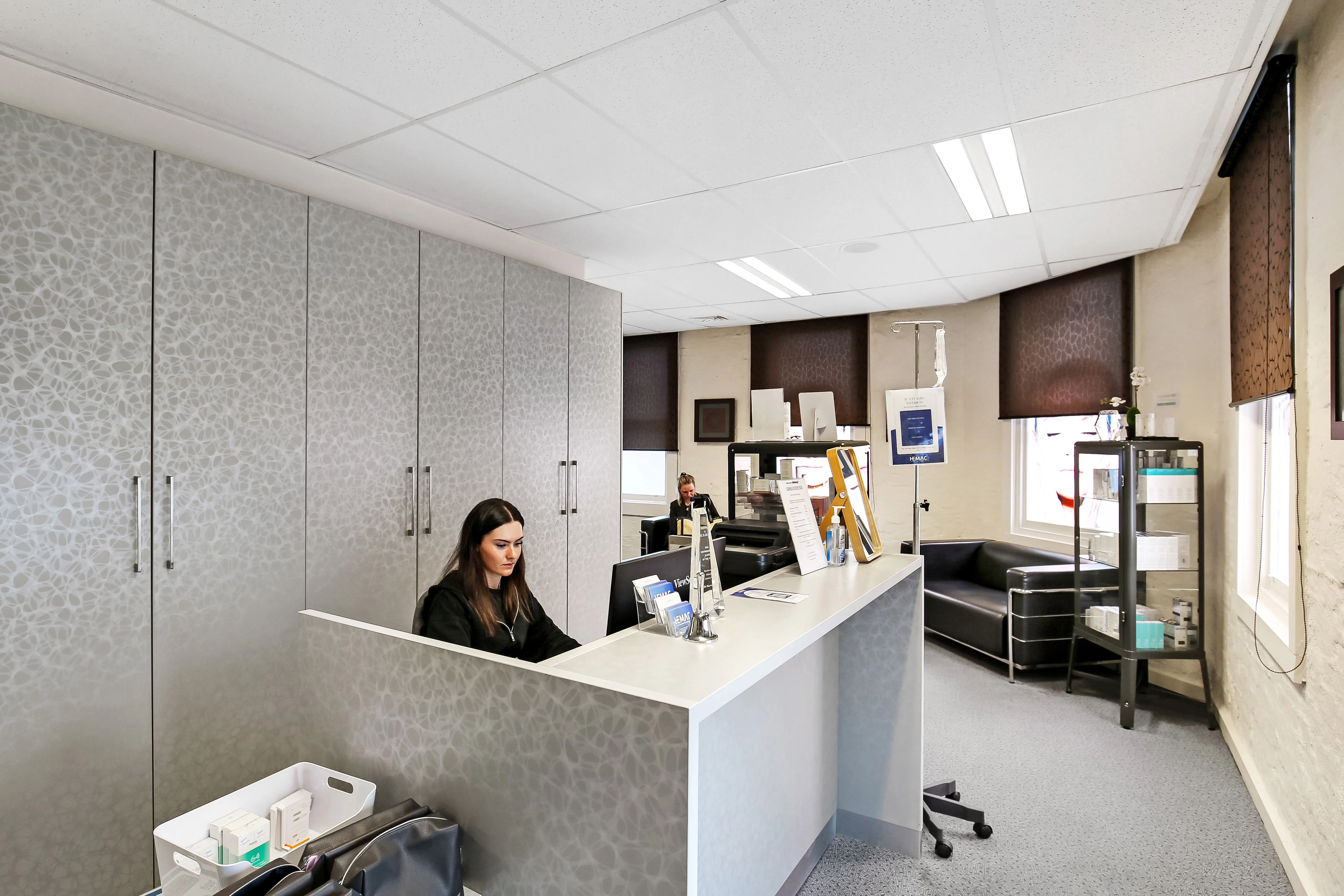 HEMAC clinic reception and treatment lounge — warm, welcoming interior